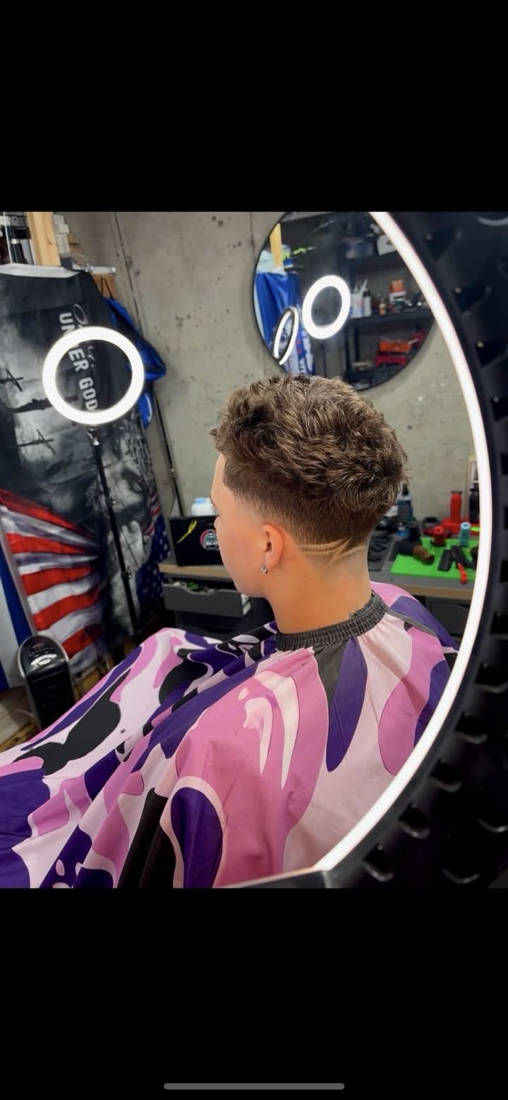Back of head with taper fade and design line