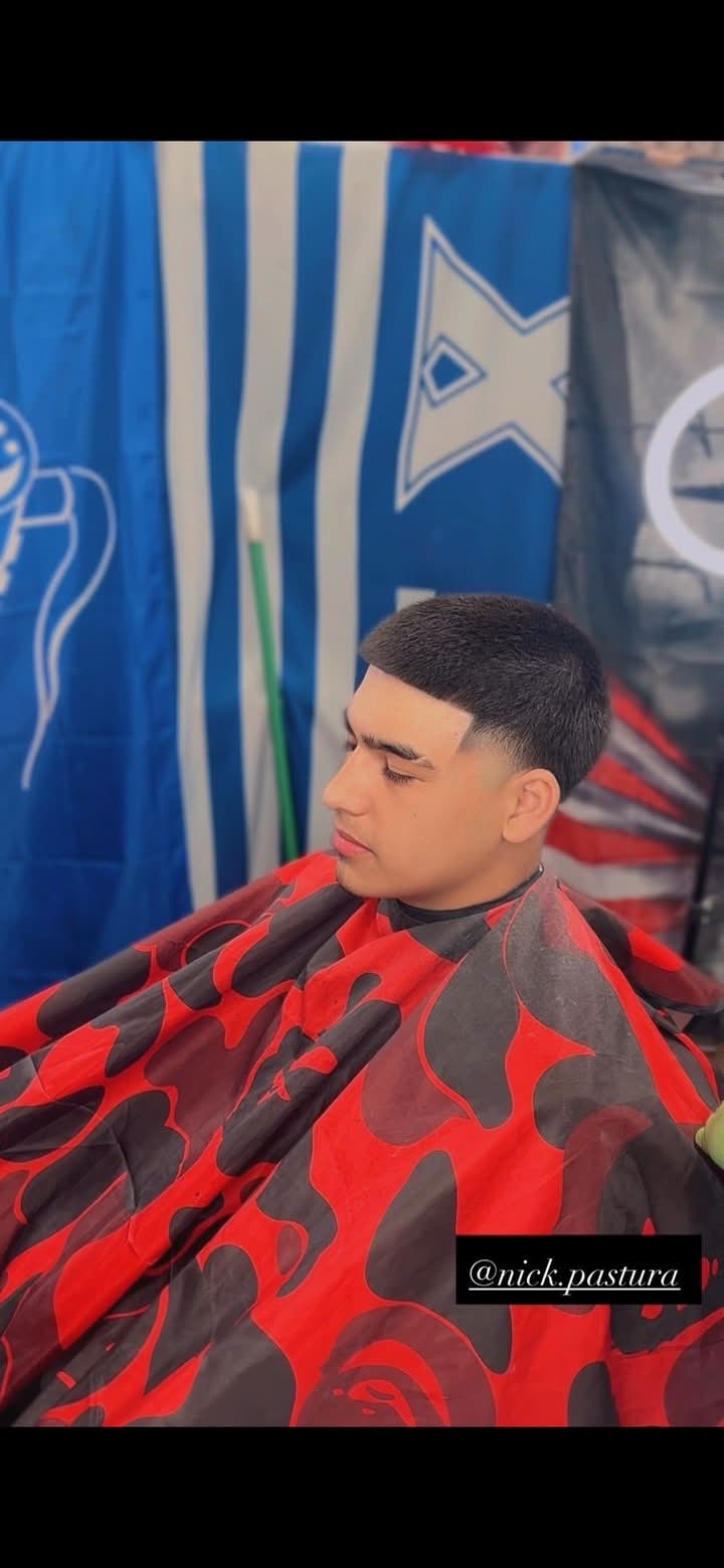 Clean skin fade with crisp lineup by Blessed by RB