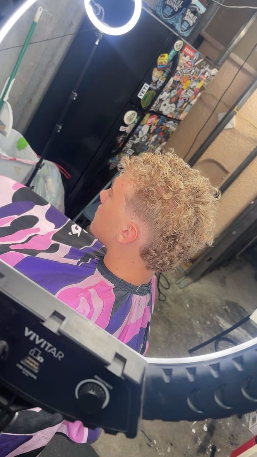 Blonde curly cut with taper fade by Blessed by RB