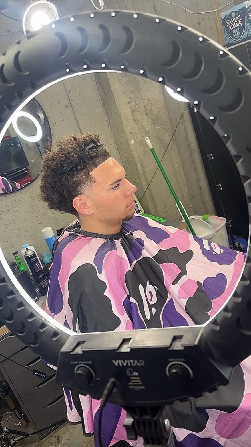Curly top with taper fade by Blessed by RB